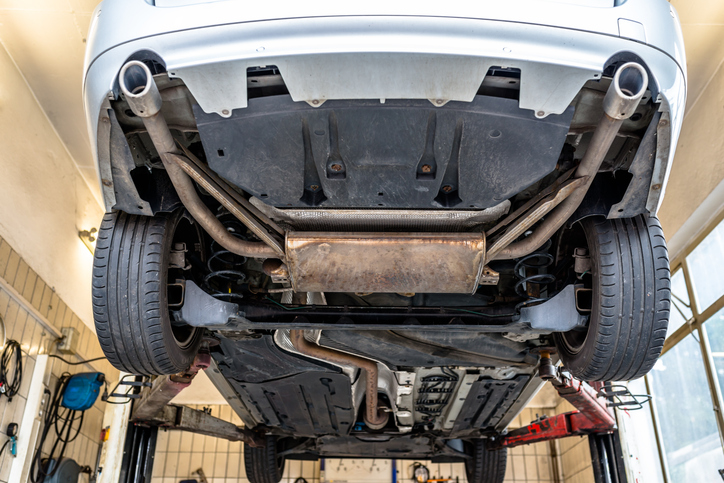 Undercarriage of car showing exhaust system